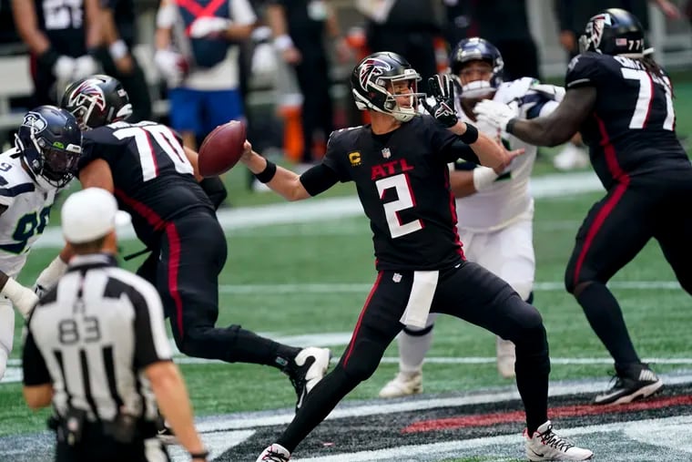 Falcons quarterback Matt Ryan (2) working in the pocket against the Seahawks on Sept. 13. This game against the Bears is this week's best bet by Vegas Vic.