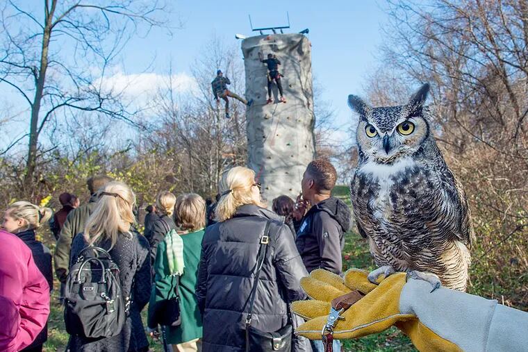 Oden, a great horned owl, was a featured attraction at the Discovery Center launch, as was a 30-foot climbing wall. The plan for the $17 million Discovery Center was jointly crafted by the National Audubon Society and Outward Bound.