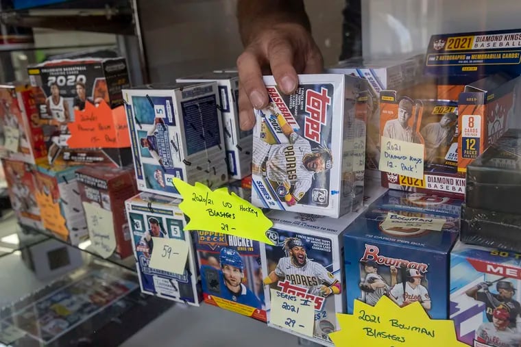 Bill Mason with a display of box sets of sports cards. (Alejandro A. Alvarez/The Philadelphia Inquirer/TNS)