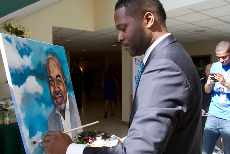 At Sharon Baptist , Ivben Taqiy paints a portrait of E. Steven Collins before the service in West Philadelphia.