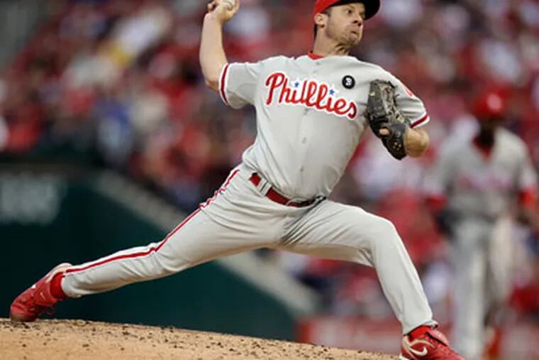 Despite allowing seven hits, Roy Oswalt only gave up one run in five innings. (Jeff Roberson/AP)