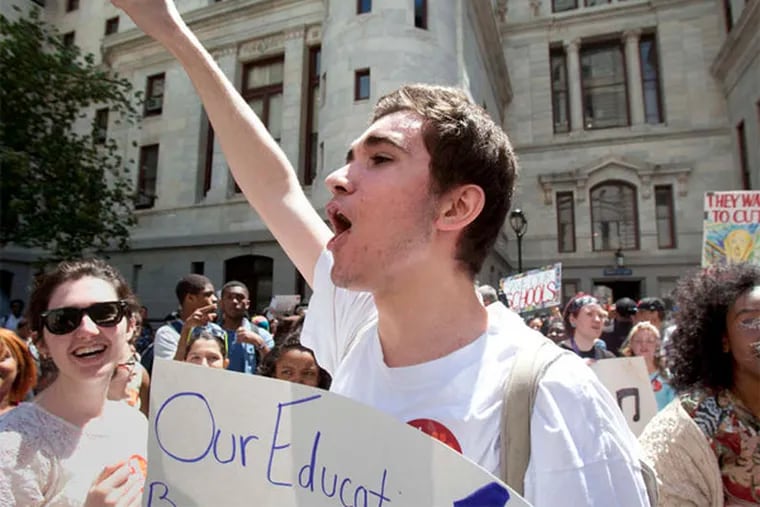 Masterman sophomore Ensar Tota joins hundreds of student protesters outside City Hall. (ED HILLE / STAFF PHOTOGRAPHER )