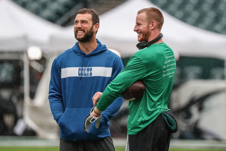 Andrew Luck and Carson Wentz got together for a chat during warmups for the Colts-Eagles game last September.