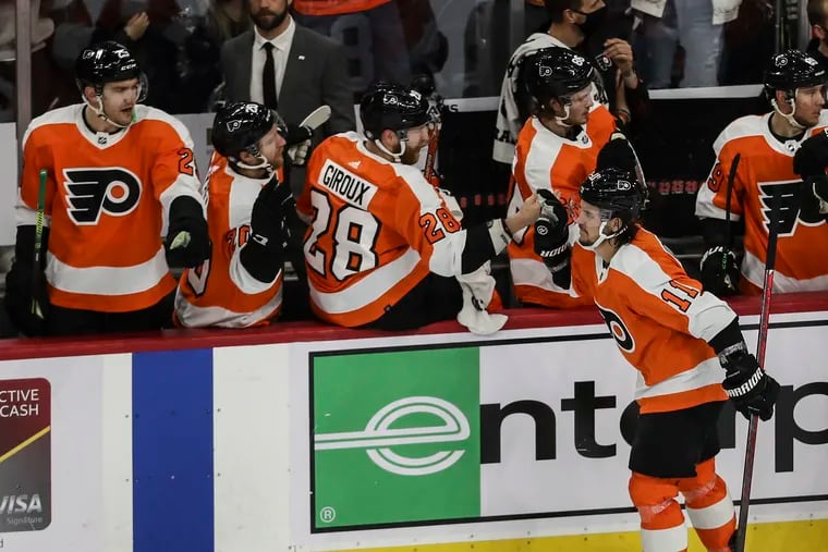 Flyers Travis Konecny celebrates his goal against the Islanders with teammates during the second period at the Wells Fargo Center.