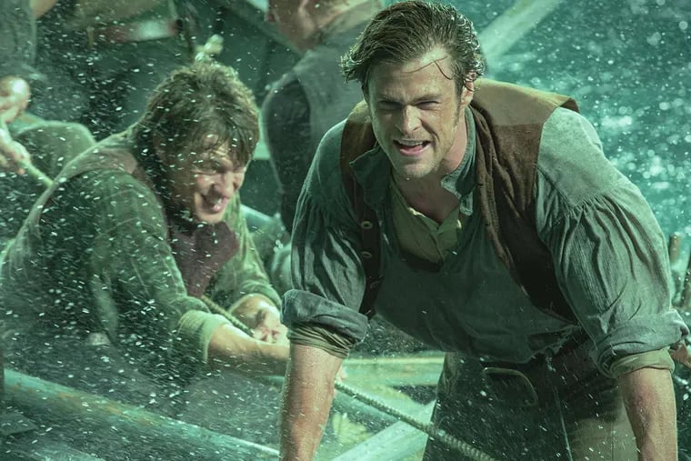 Chris Hemsworth (R), as Owen Chase, and Sam Keeley as Ramsdell, in a scene from the film, "In the Heart of the Sea."
