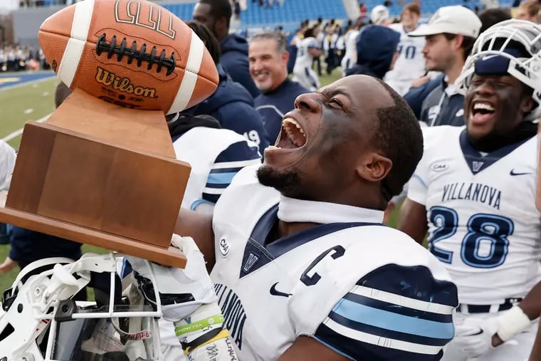 Villanova running back Justin Covington celebrates after the team's win at Delaware on Nov. 20. With the win, the Wildcats won their first CAA title since 2012.