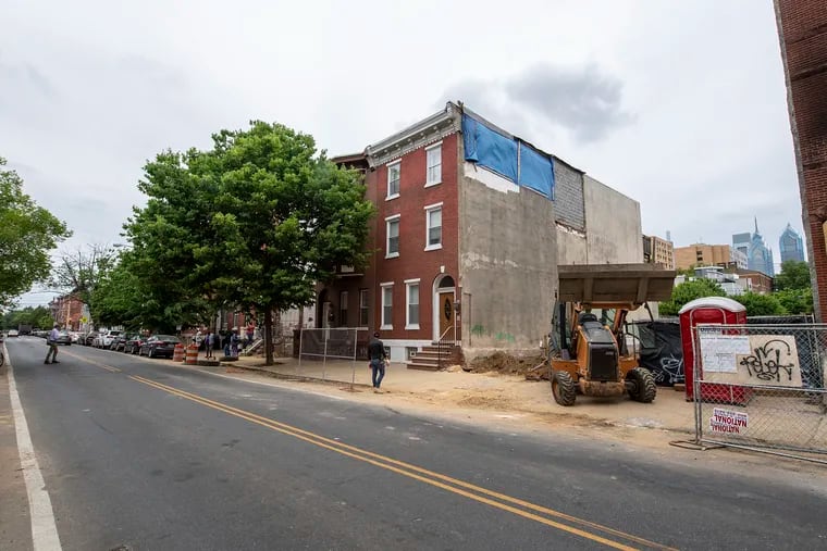 Demolished properties and construction work is shown along the 1500 block of Christian Street in May 2021. In an effort to stop the rapid demolition of homes in the historical Black neighborhood nicknamed "Doctors Row," City Council passed a one-year demolition moratorium that expired July 1.