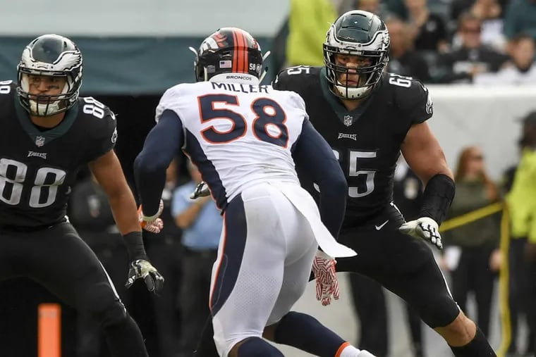 Eagles right tackle Lane Johnson (65) gets ready to block the Broncos’ Von Miller on Nov. 5.