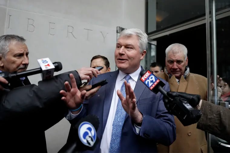 John "Johnny Doc" Dougherty, Local 98 leader, speaks to the media as he departs the federal courthouse, Friday, Feb. 1, 2019, in Philadelphia. Dougherty, a powerful Philadelphia union leader has pleaded not guilty in a bribery and embezzlement case that reaches City Hall.  (AP Photo/Matt Slocum)