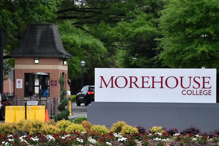 In this Friday, April 12, 2019 photo, people enter the campus of Morehouse College in Atlanta.  (AP Photo/Mike Stewart)