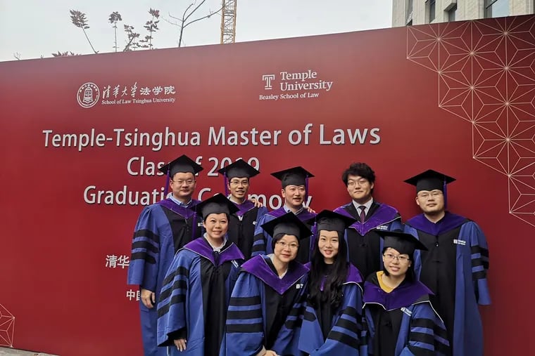 Students celebrate graduation at 20th anniversary of Temple-Tsingua LL.M program.