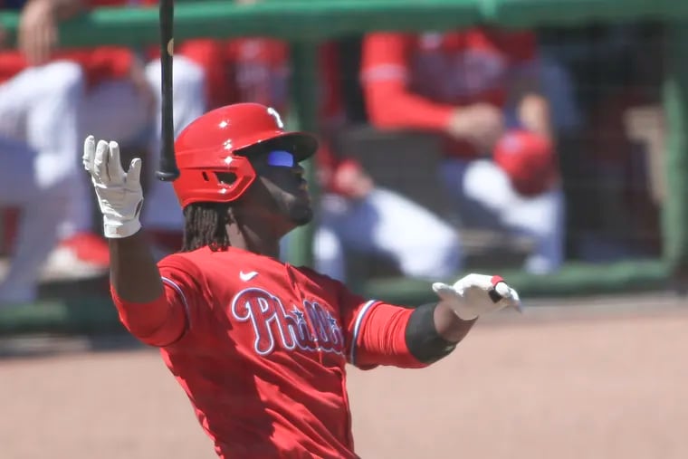 Odubel Herrera watches his solo home run against the Yankees Thursday.