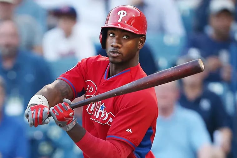Phillies' Domonic Brown checks his swing during his first at bat as the Phillies play New York Yankees in a Spring Training game in Tampa, FL on March 19, 2015.  ( DAVID MAIALETTI / Staff Photographer )