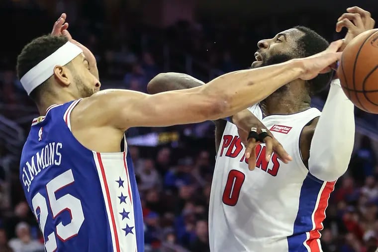 Ben Simmons knocks the ball away from Detroit's Andre Drummond during the fourth quarter of the Sixers' 116-102 win over the Pistons Monday.