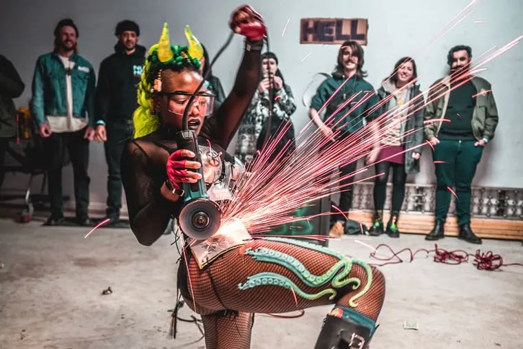 Performer Maki Roll sends sparks flying with a grinder act at a previous iteration of the World Oddities Expo, which moves into the Pennsylvania Convention Center on April 27th.