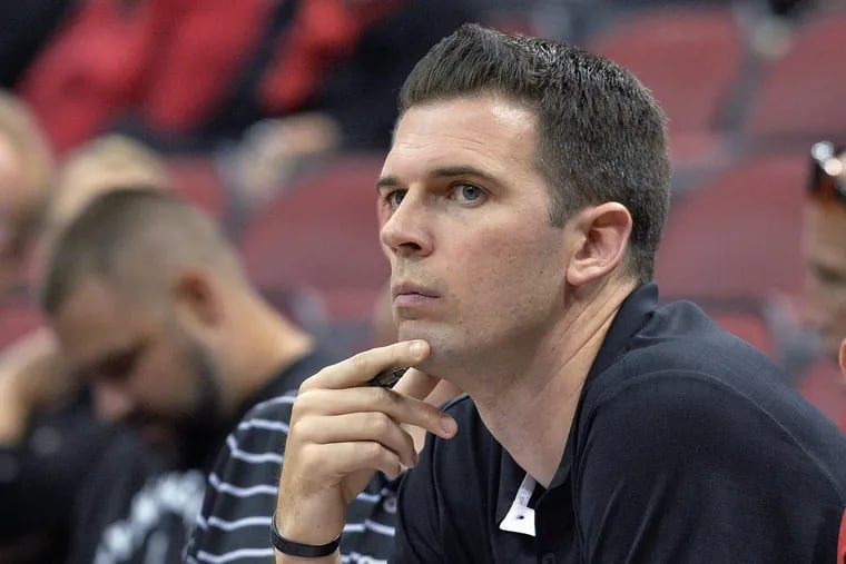 David Padgett has taken over for Rick Pitino as Louisville coach.
