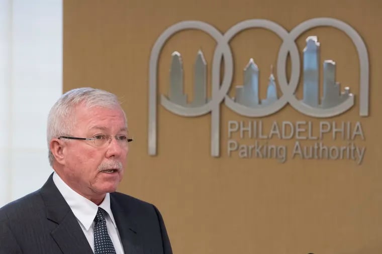 In a file photo, Joseph Ashdale, board chair of the Philadelphia Parking Authority, addresses a public hearing on Sept. 27, 2016. ( CLEM MURRAY / Staff Photographer )