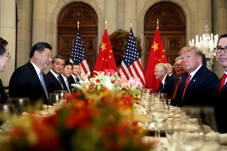 In this Dec. 1, 2018, file photo, U.S. President Donald Trump, second right, and China's President Xi Jinping, second left, attend their bilateral meeting at the G20 Summit in Buenos Aires, Argentina, as they approach a U.S.-Chinese cease fire on tariffs.