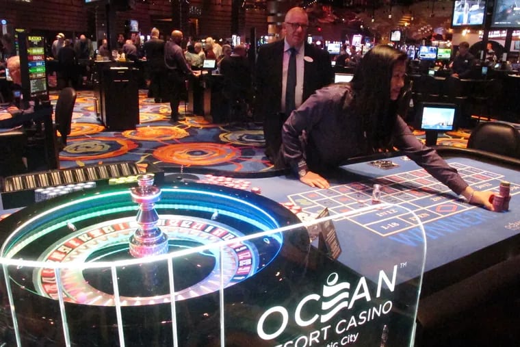 A dealer pushes a stack of chips toward a gambler at the Ocean Resort Casino in Atlantic City on Sept. 28. The Ocean Resort and the Hard Rock casino will both mark their 100th day of operation on Thursday.