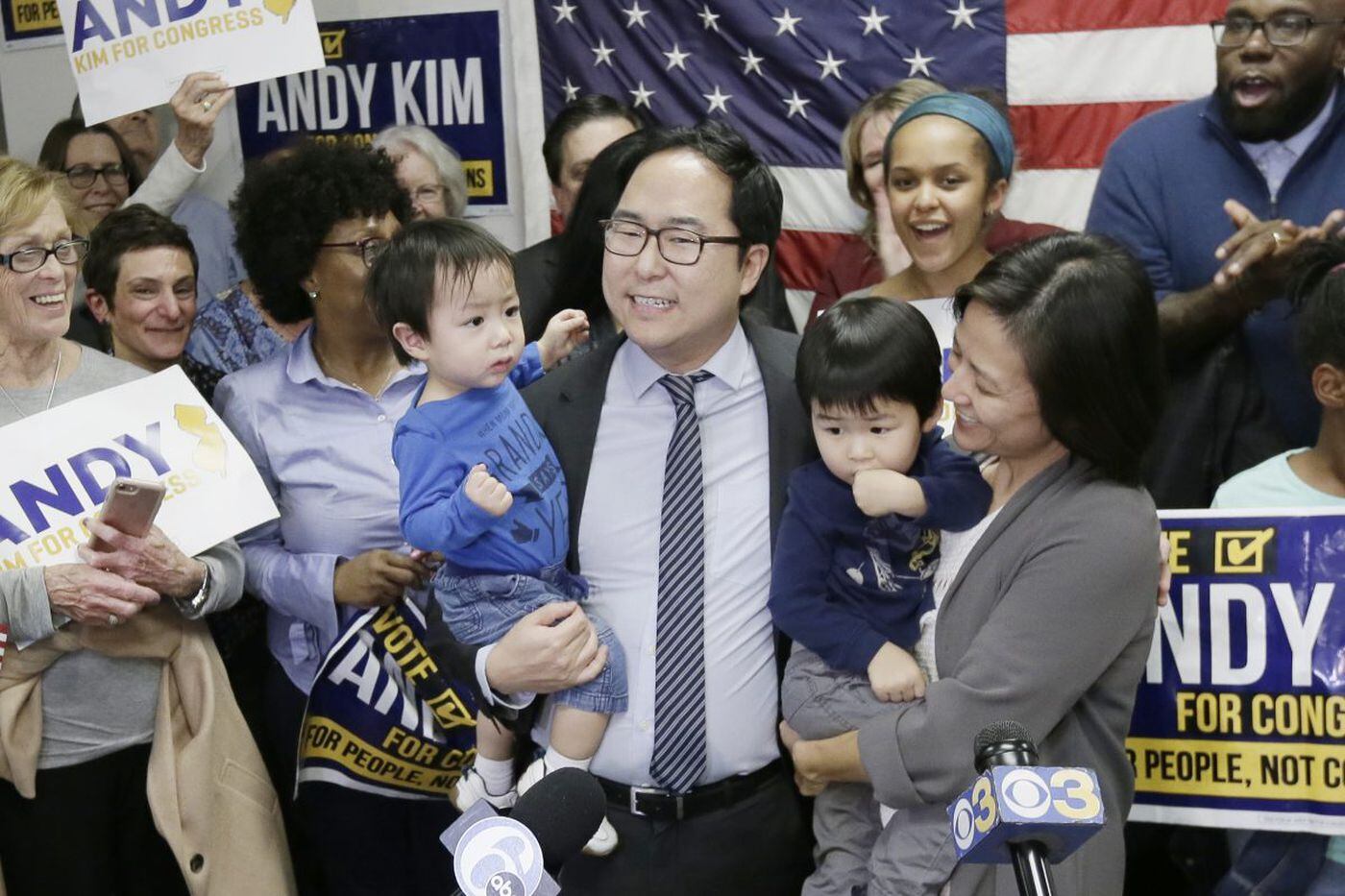 Democrat Andy Kim stands with his family after announcing that he is the projected winner of the NJ 3rd District Congressional race. The announcement was before a packed crowd at his Mt. Laurel headquarters on Nov. 7, 2018.
