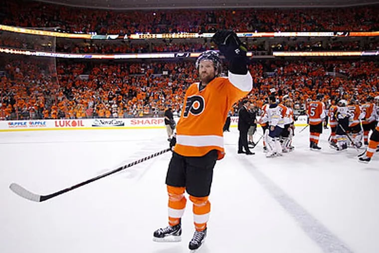 Scott Hartnell saluted the fans at the Wells Fargo Center after the Flyers' Game 7 win over the Sabres. (Yong Kim/Staff Photographer)