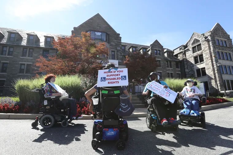 Inglis House residents prepare to protest the sale of the Inglis House to a for-profit group in September.  The Inglis House Residents Council held a "wheelchair rally" to protest the sale they feel will cut services.