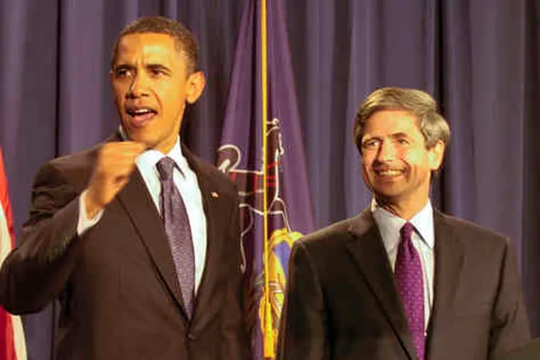 President Obama cheers with crowd for Rep. Joe Sestak yesterday at the Convention Center.