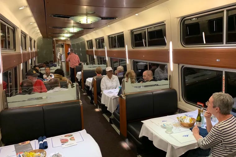 Travelers dine on the Amtrak Crescent as it rolls through Catlett, Va., on Sept. 9.