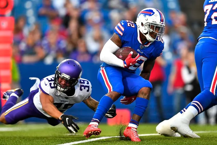 With the Vikings, safety Marcus Epps (39) comes up short trying to tackle Buffalo's Marcus Murphy in a preseason game.