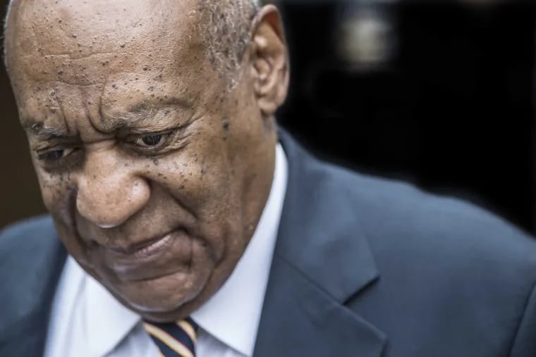 Bill Cosby walks up the sidewalk to the Montgomery County Courthouse on Wednesday June 14, 2017, the third day of jury deliberation in his sexual assault trial.