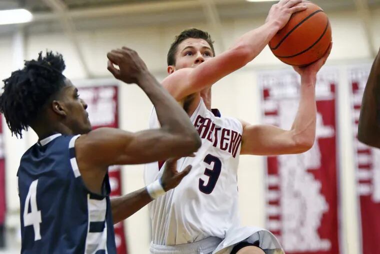 Eastern’s Jesse Barbera drives to the hoop past Atlantic City’s Ray Bethea  on Saturday.