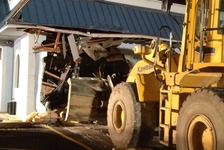 A stolen bulldozer was rammed into The Piston Diner in Westville, N.J. (Frank Kummer / Staff)