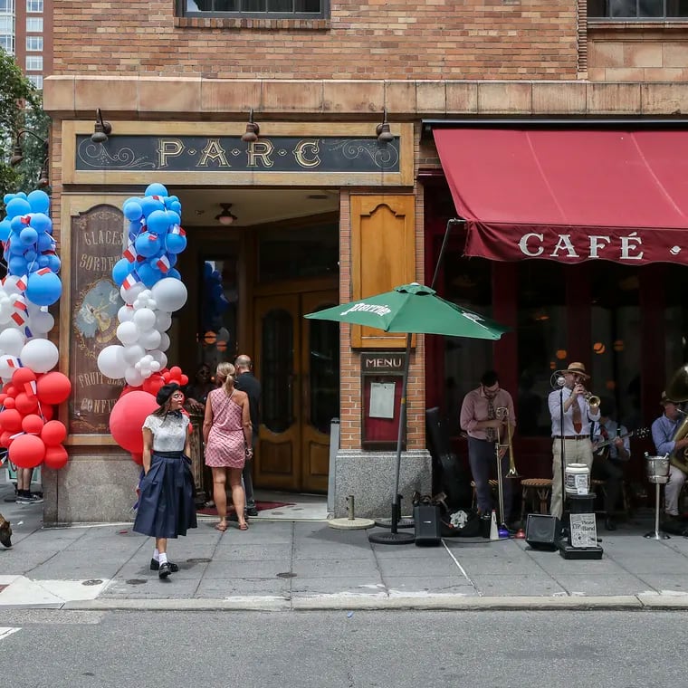 Drew Nugent and the Midnight Society band perform outside of Parc restaurant in the Rittenhouse section of Philadelphia to celebrate Bastille Day on Friday, July 14, 2023.