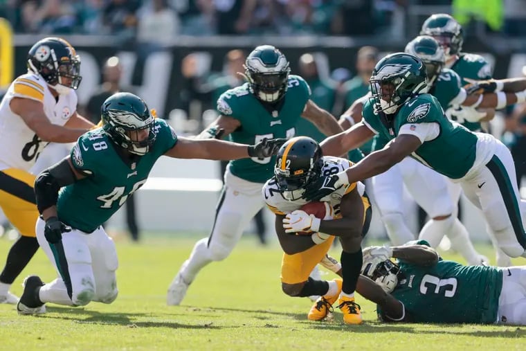 Steelers wide receiver Steven Sims is surrounded by Eagles on a kickoff return on Oct. 30, 2022.