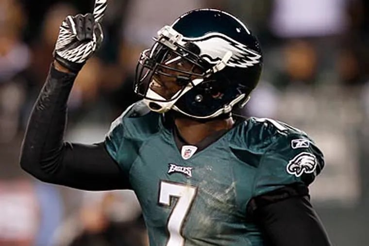 Michael Vick and the Eagles still have a chance to make the playoffs despite a 6-8 record. (Yong Kim/Staff Photographer)