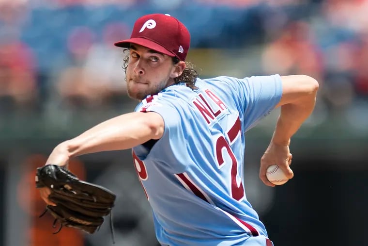 Aaron Nola pitches in the first.
