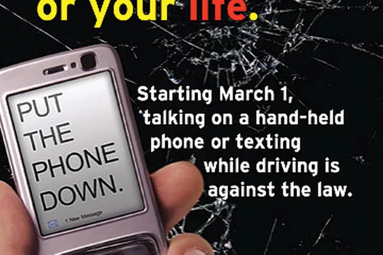 A "Put the Phone Down" poster created by the New Jersey Division of Highway Traffic Safety.