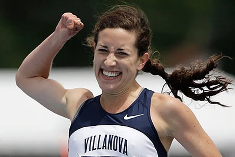 Villanova's Sheila Reid won the 5,000-meter and 1,500-meter titles at the NCAA championships. (Charlie Neibergall/AP)