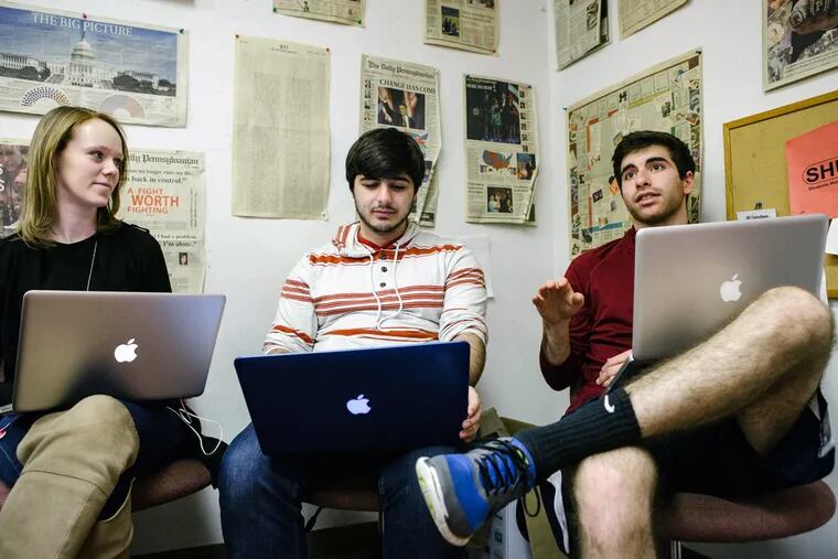 (From left) Enterprise editor Jessica McDowell, Julio Sosa, news photo editor, and Nick Buchta, senior sports editor, conduct a staff meeting at the Daily Pennsylvanian in West Philadelphia.