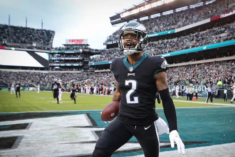 Philadelphia Eagles cornerback Darius Slay celebrates after returning an interception for a touchdown in the second quarter against the Saints. Eagles play the New Orleans Saints on Sunday, Nov. 21, 2021.
