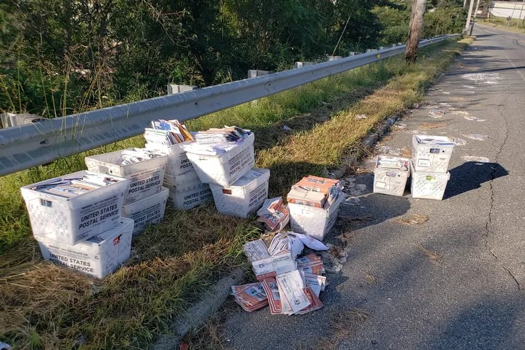 A Camden resident found a pile of mail dumped on the side of road in Pennsauken on Sunday.