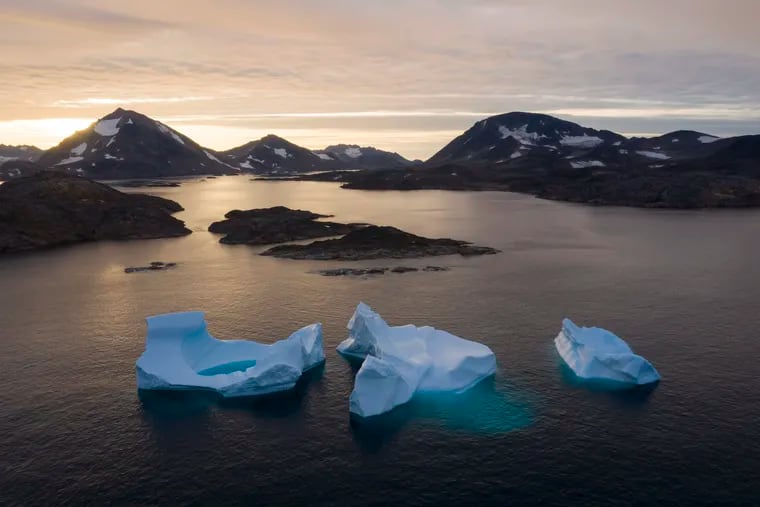 Ice floating in Greenland in August 2019 after record warmth, but it also now can lay claim to the coldest reading on record in the Northern Hemisphere.