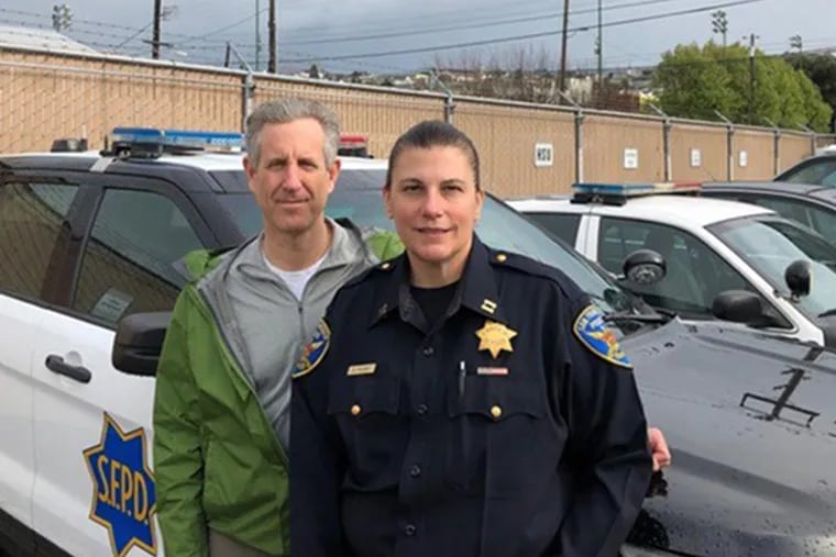Ed Kressy with San Francisco Police Capt. Renee Pagano earlier this year.