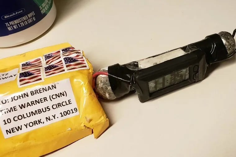 This image obtained Wednesday, Oct. 24, 2018, and provided by ABC News shows a package addressed to former CIA head John Brennan and an explosive device that was sent to CNN's New York office.