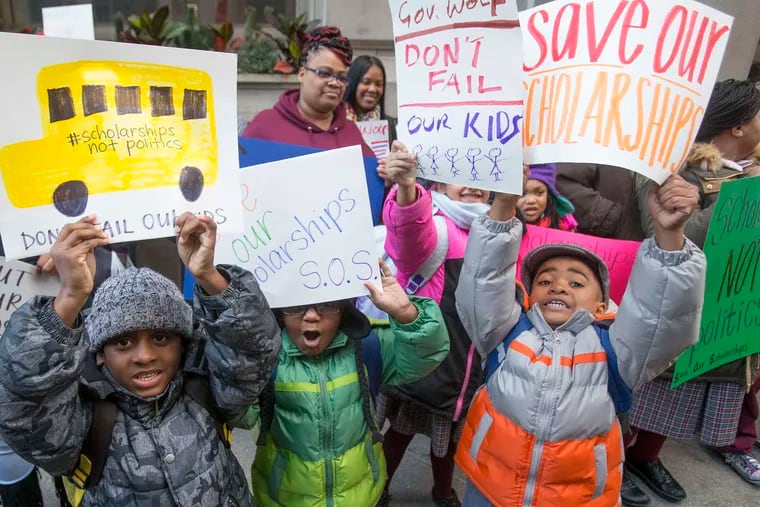Parents, children, and others rally in support of corporate tax credits for scholarships for low-income students in nonpublic schools. Expanding school choice is another recommendation to effect wider change.