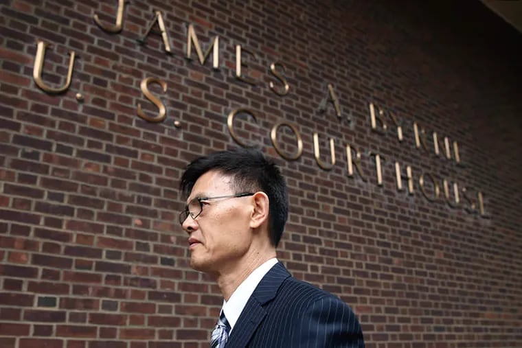 Xiaoxing Xi, enters the federal courthouse in Center City in 2015, days after he was accused of providing sensitive U.S. technology to China.
