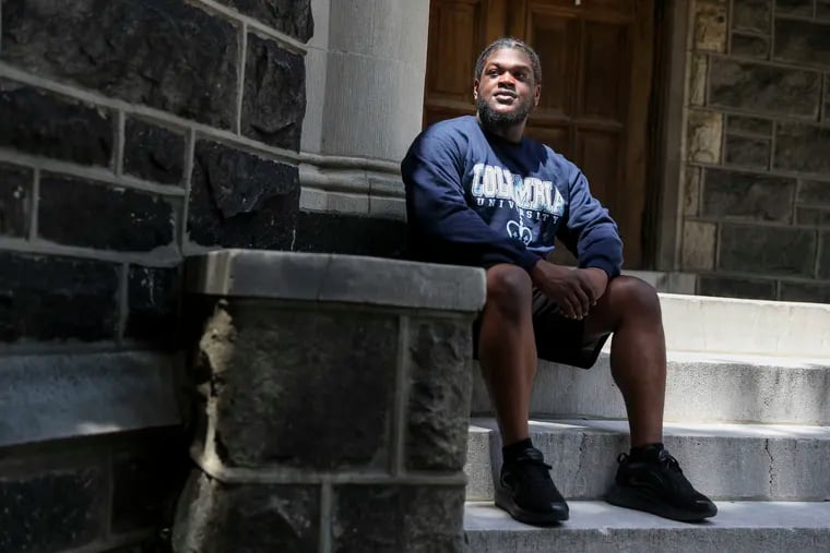Clive Thompson Jr. sits outside the First United Methodist Church of Germantown, where his parents have been living in sanctuary since August 2018. 
He was accepted to Columbia University, and has moved to New York City to begin studies, but is not eligible for federal aid because he is a DACA recipient.