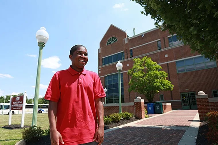 Xavier Johnson, valedictorian of Burlington County College, will be attending Drexel University using the Drexel at BCC program, so he can remain on the BCC campus and complete the second two years of a bachelor's degree Friday, July 11, 2014. ( DAVID SWANSON / Staff Photographer )
