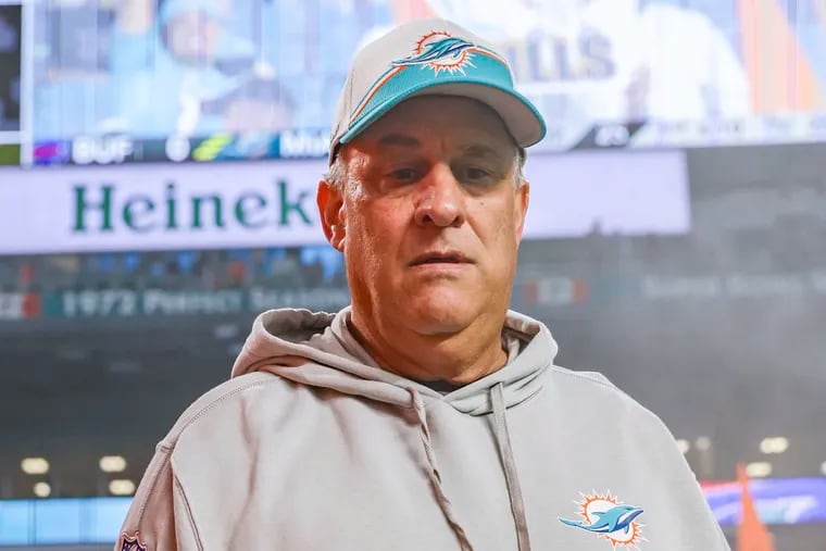 Former Miami Dolphins defensive coordinator Vic Fangio walks the field before a game against the Buffalo Bills.