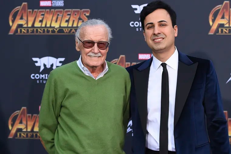 FILE - In this April 23, 2018, file photo, Stan Lee, left, and Keya Morgan arrive at the world premiere of "Avengers: Infinity War" in Los Angeles. Morgan, the former business manager of Lee has been arrested on elder abuse charges involving the late comic book icon. Los Angeles police say  Morgan was taken into custody in Arizona early Saturday, May 25, 2019, on an outstanding arrest warrant. Morgan was charged earlier this month with felony allegations of theft, embezzlement, forgery or fraud against an elder adult, and false imprisonment of an elder adult.